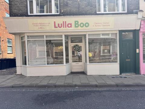 Nos. 51 & 51A High Street, occupying the site of the short-lived 17th century inn named “The Lyon/Lion”.